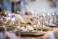 Beautiful intimate table setting with flowers and candles for a celebration
