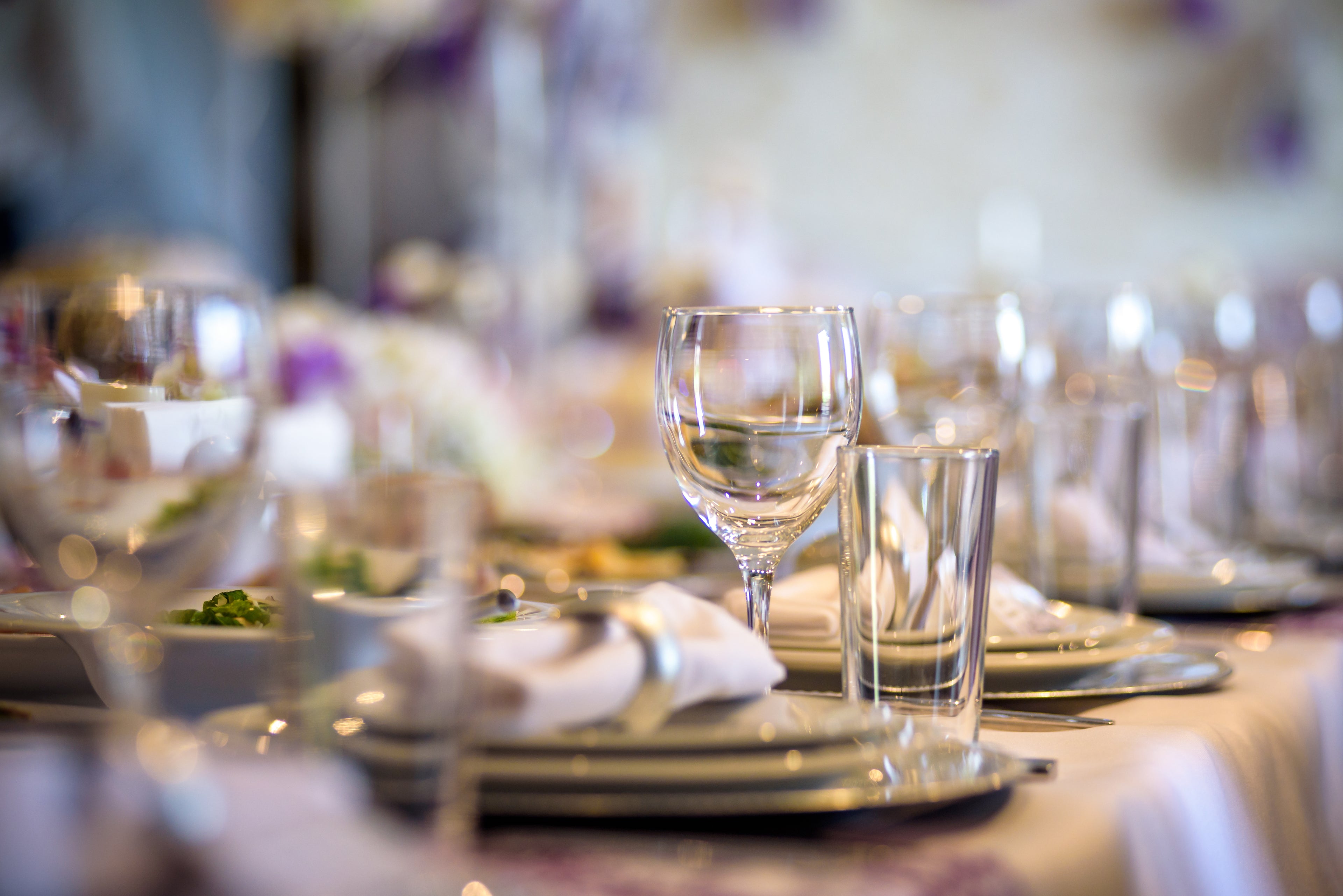 Beautiful intimate table setting with flowers and candles for a celebration